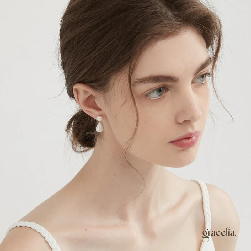 Oceane Double Pearl Drop Earrings: Delicate Bestseller Charm. - Second Image